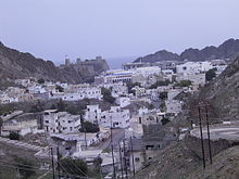 Old Muscat from the south, forts in the background Old Muscat.jpg