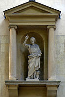Statue in a niche on a cathedral from Paris