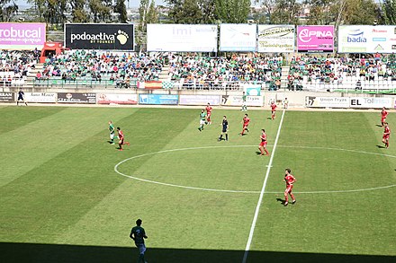 A football fixture between CD Toledo and Real Murcia at the Estadio Salto del Caballo.
