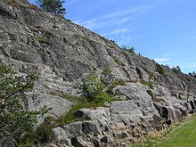 Glacially plucked granitic bedrock near Mariehamn, Aland PluckedGraniteAlandIslands.JPG