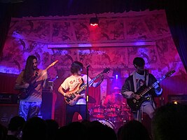 Polyphia performing in 2019