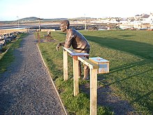 Bronze statue of a fisherman on the sea-front (Port William) by Andrew Brown (1999)