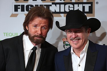 Brooks & Dunn had three number ones in 1998, one in collaboration with Reba McEntire. Ronnie Dunn & Kix Brooks by Gage Skidmore.jpg
