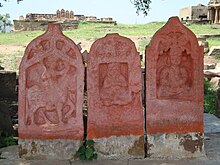 Memorials depicting warrior on horse (left) and sitting persons (centre and right). Chhatardi, Bhuj. Samadhi near chatri2.JPG