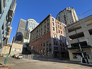 Photograph of a cluster of buildings at a street intersection