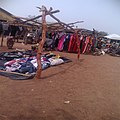 Second_hand_clothing_line_on_display_at_Funsi_Market_in_Upper_West_Region,_Ghana