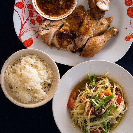Som tam, grilled chicken and sticky rice is a popular combination.