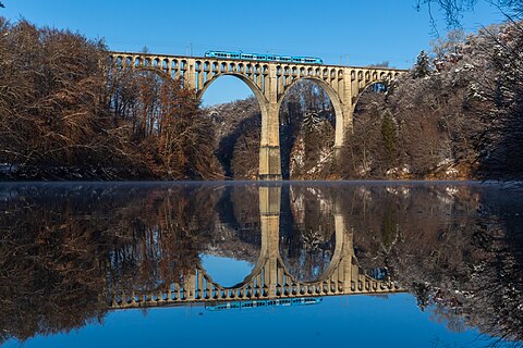 TPF's RABe 527 198 crosses the Grandfey viaduct between Düdingen and Fribourg, Switzerland