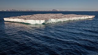 Table iceberg west of Sjuøyane, Arctic ocean