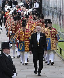 English and Scotish heralds, wearing tabards, in procession during the Coronation of Charles III and Camilla (2023). The King's Coronation (52874898271) (cropped).jpg