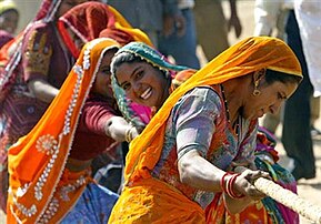 A team of women taking part in tug of war. Tug of war, at Pushkar Fair, Rajasthan.jpg