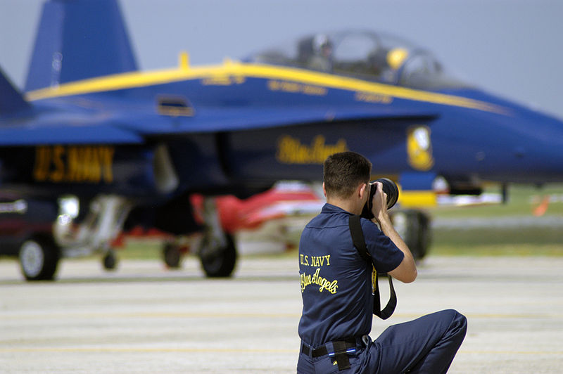 File:US Navy 040514-N-0295M-045 Draftsman 2nd Class Jeffrey Ballge photographs one of the Blue Angel's six F-A-18A Hornets.jpg