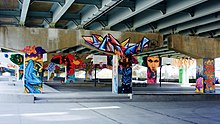 Basketball courts at Underpass Park, an urban park located underneath an underpass in the West Don Lands. Underpass Park (22278204402).jpg