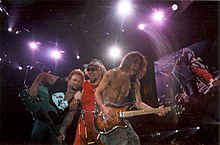 Van Halen during their 2004 reunion period. Left to right: Michael Anthony, Sammy Hagar, Eddie Van Halen. VanHalenwithHagar.jpg