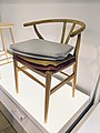 Wishbone Chair with accessory seat covers on display