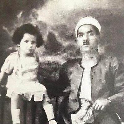 Umm Kulthum as a toddler, with her father Ibrahim El Beltagi