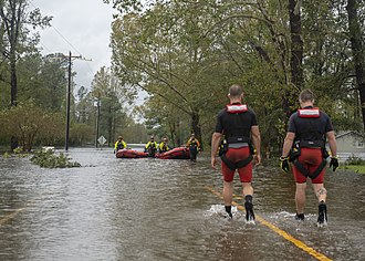 Hurricane response involves working in hazardous conditions, including contamination and electrocution hazards from floodwater. 180916-G-CZ043-1163 (44060416364).jpg