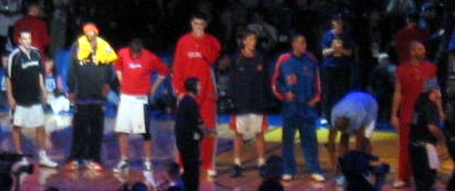 Yao (fourth from left) standing with the Sophomores team during the 2004 Rookie Challenge game.