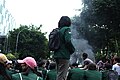 A protestor stands in the middle of a sit in protest in Medan