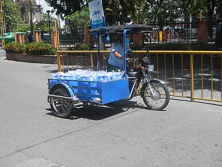 A typical garong delivering distilled water in Baliuag, Bulacan