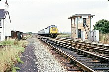 Astley signal box and level crossing over the Liverpool and Manchester Railway in 1979 Astley signalbox.jpg