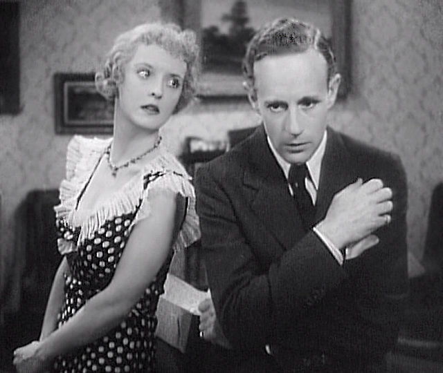 Bette Davis (as Mildred) and Leslie Howard in the 1934 film version