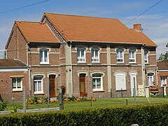 Habitations groupées par quatre.