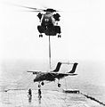 CH-53 Sea Stallion with OV-10 Bronco over USS Iwo Jima (LPH-2) in 1980.jpg