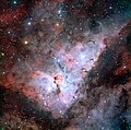 အိသာ ကရိနီ နက်ဗျူလာတွင် ကြယ်များနှင့်ဖုန်မှုန်များအား ဖော်ထုတ်ပြနေပုံ၊ Credit ESO