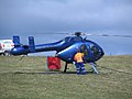 Central South Island Helicopters ZK-HDN MD 520N, refuelling while fighting the Mt Allan forest fire near Dunedin in New Zealand