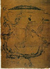 Silk painting depicting a man riding a dragon, painting on silk, dated to 5th-3rd century BC, Warring States period, from Zidanku Tomb no. 1 in Changsha, Hunan Province Changshadragon.jpg