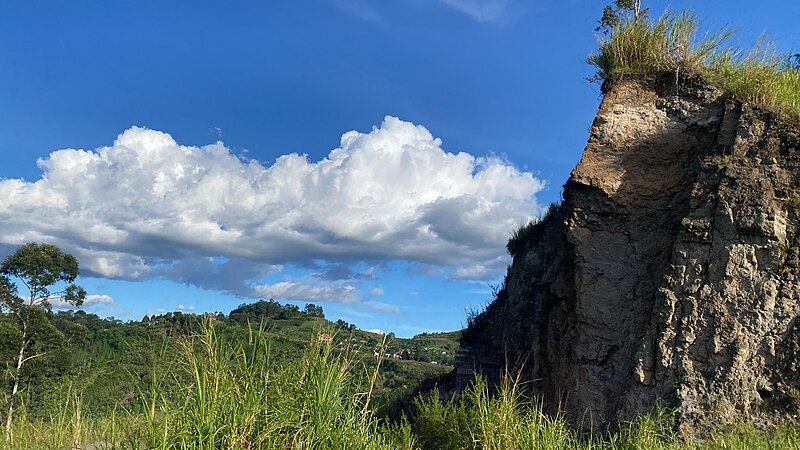 File:Clouds over a hilly landscape with a rocky hill in Rubirizi District in Western Uganda 02.jpg