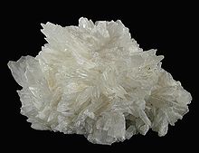 Colemanite from the Boron mine. Size: 6.9 x 5.4 x 5.4 cm.