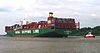 Containerskab CSCL Atlanterhavet med hækbugsebåd Kotug Boxer på vej ned ad floden Elbe i juni 2015.jpg