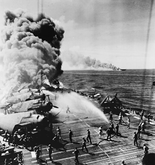 Crewmen fighting fires aboard USS Belleau Wood (CVL-24), 30 October 1944 (80-G-342020)