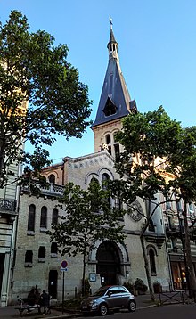 Außenansicht des frühen 20. Jh.s.  Kirche Saint-Antoine, mit Glockenturm