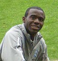 Young black man with close-cropped hair wearing an anorak