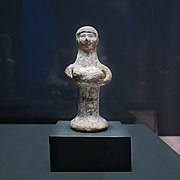 Pillar figure shows antiquity of "handbra"-like pose
