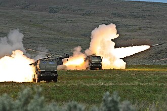 Firing High Mobility Artillery Rocket systems.jpg