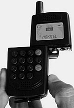 A disguised firearm such as this cell phone gun is an AOW. Four-barreled cell phone gun.jpg