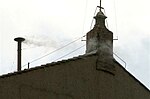 Vit rök ovanför Sixtinska kapellet 2005, som kungör valet av Benedictus XVI som påve.