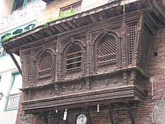 Carved wood window known as Gajhya at Dhalasikwa Baha, Kathmandu.