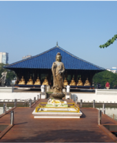 Guanyin statue in front of main temple hall