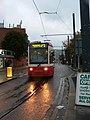 Tramlink tram 2546 at the junction of Tamworth Road and Ruskin Road in Croydon