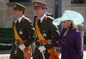 The Hereditary Grand Duke of Luxembourg and The Grand Duke both wearing the insignia of the order. They are accompanied by Grand Duchess Maria Teresa of Luxembourg. GrandDuc epouse heritier.jpg