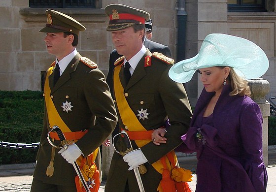 The Hereditary Grand Duke of Luxembourg and The Grand Duke both wearing the insignia of the order. They are accompanied by Grand Duchess Maria Teresa of Luxembourg.