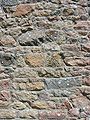 Granite wall of chapel La Hougue Bie, Jersey.jpg
