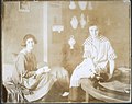 Group portrait of Joan and Lin seated in their shop, ca. 1917-1925. (9452900298).jpg