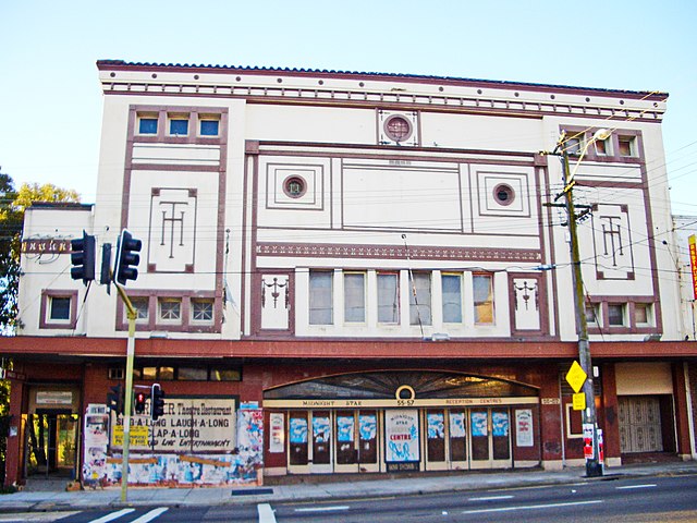 Homebush Cinema, built in 1925, is one of the many derelict establishments on the road, which operated until 1996 as a reception centre.