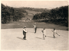 Playing golf around the fenced-off tombs of royal family members